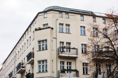 yellow corner building at autumn