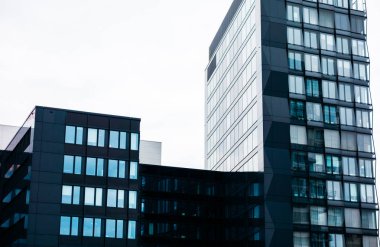 darken office complex with blue windows