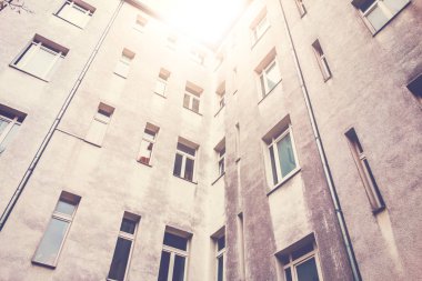 warm colored picture of backyard building from low angle view