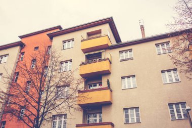 brown and orange facaded gdr house