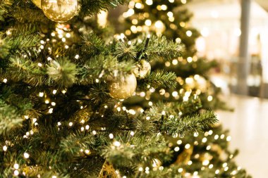 christmas tree with blurred shopping mall background