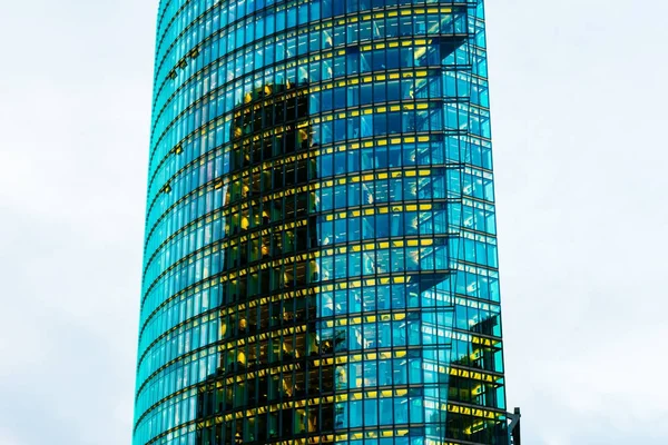 big glass skyscraper in high contrasted colors