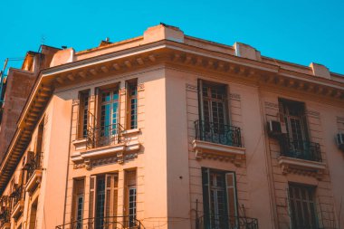 orange apartment house at greece