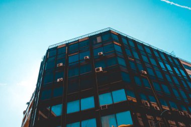 darken office or finance building with clean sky
