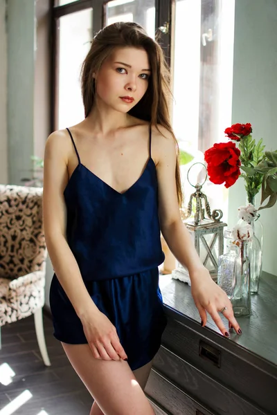 Menina bonita em roupa interior azul — Fotografia de Stock