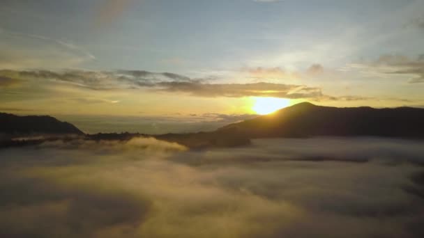 Aerial shot of active volcano crater. Sunrise Indonesia. — Stock Video