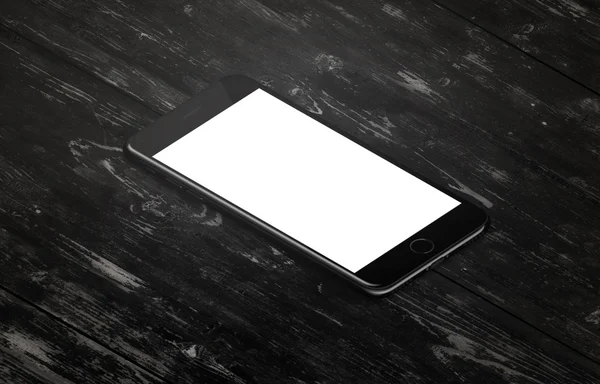 Modern mobile phone on black table. Isometric, side position — Stockfoto