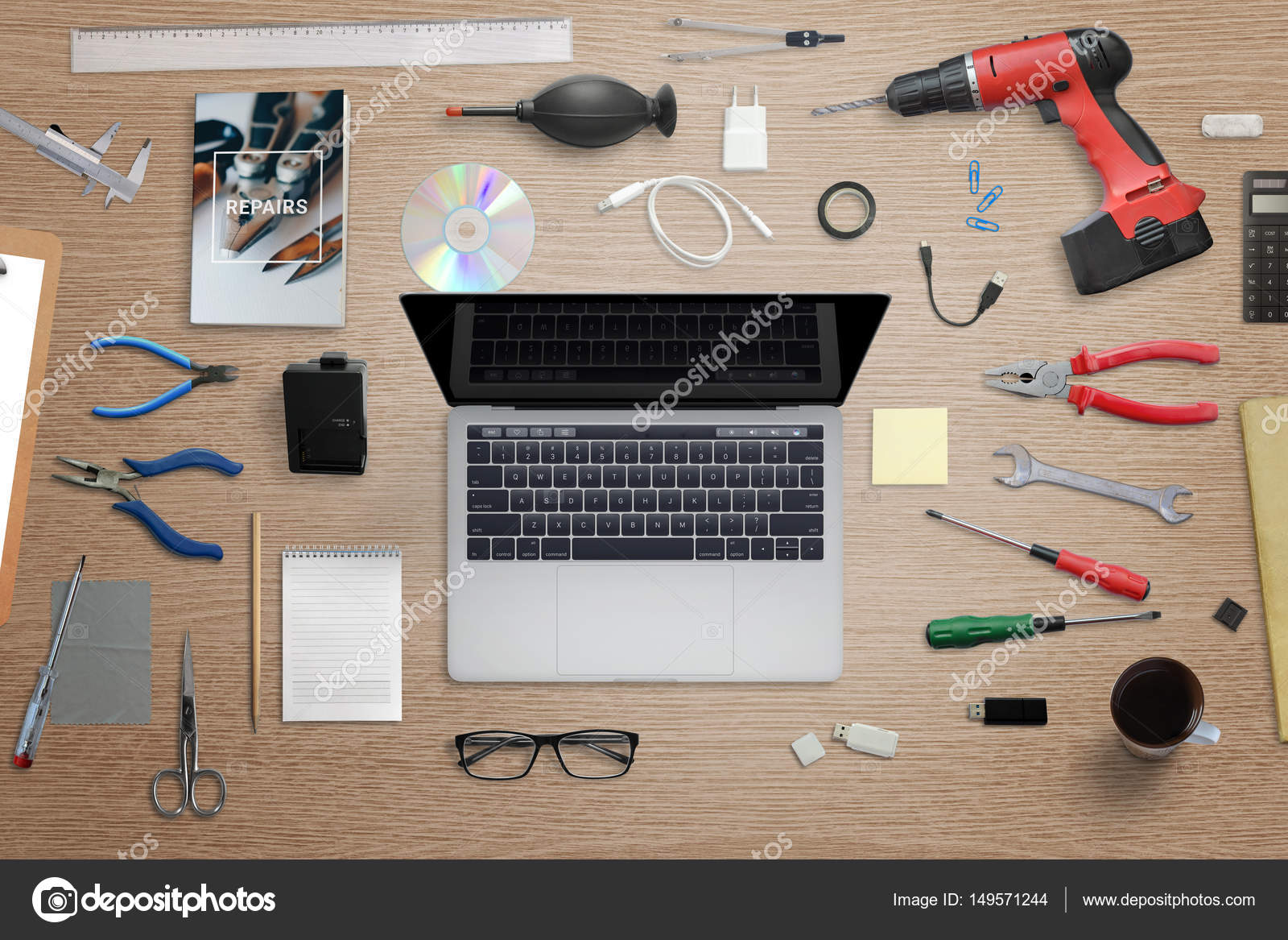 Computer Repair Work Desk Laptop Surrounded With Tools Stock