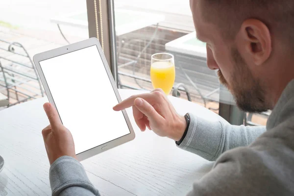 Tablet mockup. Man holding tablet in vertical position