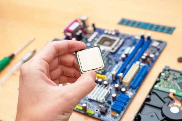 Computer Processor Hand Motherboard Ready Installation Background Hard Drive Memory — Stock Photo, Image