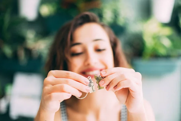 Happy Young Woman Holding House Key