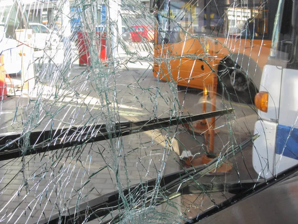 Unbreakable frontal glass damaged by crash in a public transport Stock Photo