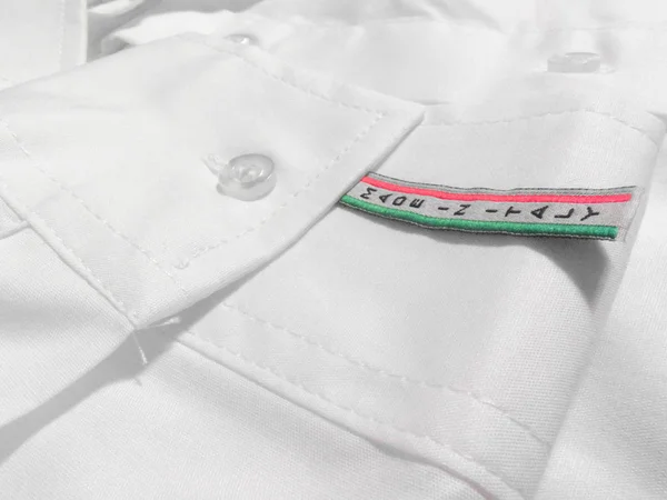 Etiqueta Made in Italy en camisa blanca —  Fotos de Stock