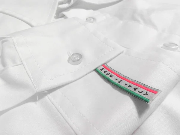 Etiqueta Made in Italy en camisa blanca — Foto de Stock