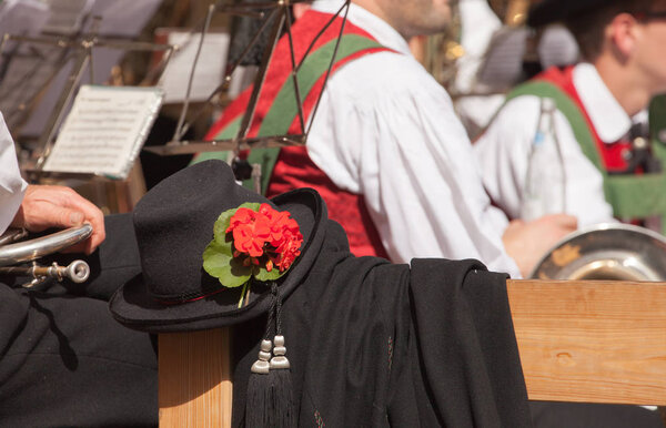 Detail of typical costume during an autumn local celebration in Val di Funes ( South Tyrol )