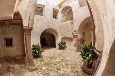 VAL ISARCO, ITALY - JULY 27, 2017: Detail from Castel Trostburg, one of the largest fortified complexes in South Tyrol. The history of the fortress dates back to the XII century