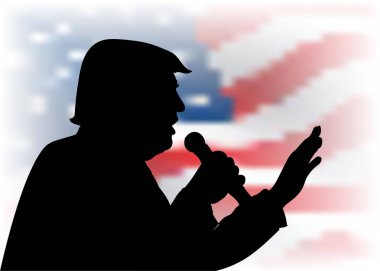 Aralık, 2016: Cumhurbaşkanı Donald Trump portre bize arka plan bayrak. siyah siluet kitleye konuşan bir mikrofon ile.