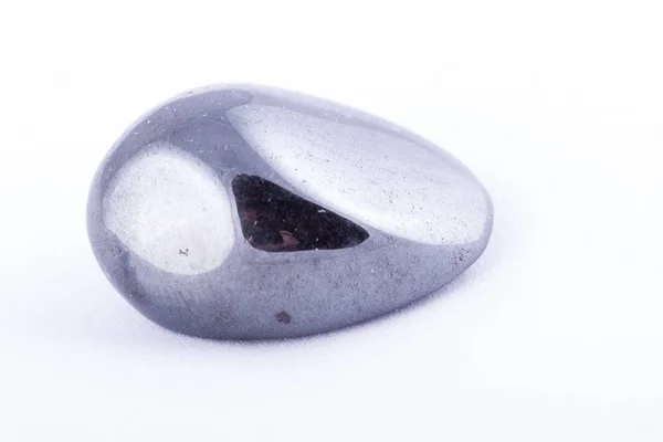 Makró kő ásványi hematit fehér háttér — Stock Fotó