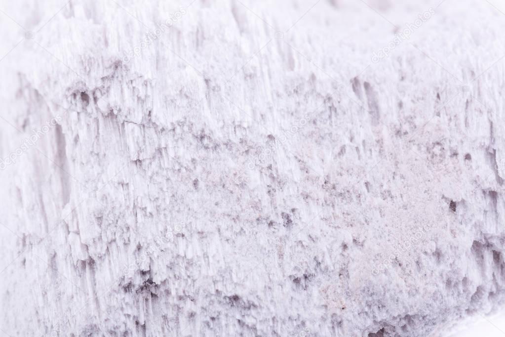 Macro mineral stone pumice stone on white background