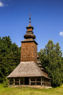 Old wooden church in the village clipart
