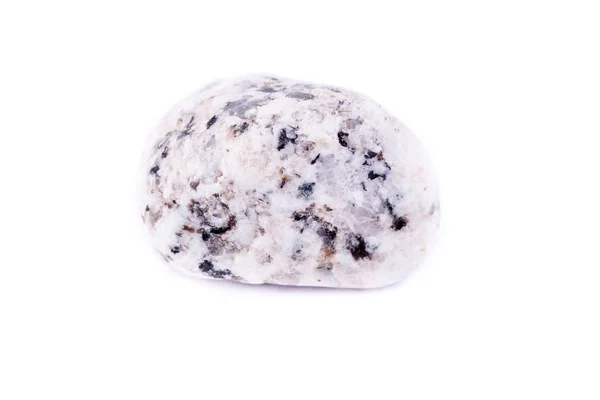 Минеральный гранитный камень на белом фоне — стоковое фото