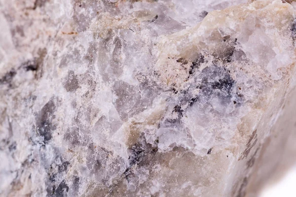 Macro minerali spodumene pietra su sfondo bianco — Foto Stock