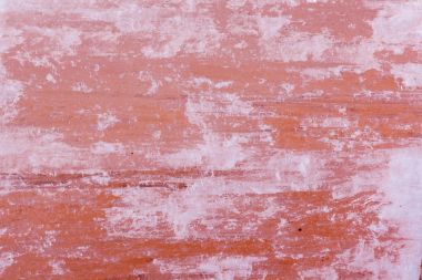 Beyaz arka plan üzerinde taş makro kırmızı mineral sıva