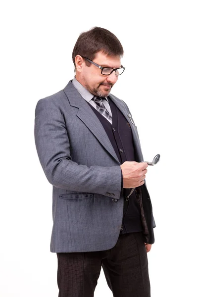 Jóképű férfi öltöny és szemüveg, óra, fehér háttér — Stock Fotó