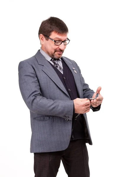 Stilig man i kostym och glasögon, med klocka, vit bakgrund — Stockfoto