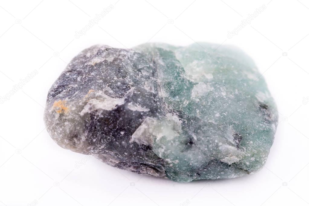 Macro mineral stone emerald on white background