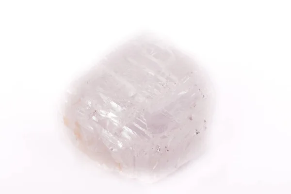 Macro mineral stone Iceland spar on white background — Stock Photo, Image