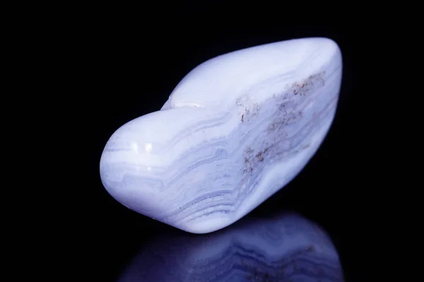 Macro mineral blue agate sapphirin in the rock on black backgrou — Stock Photo, Image