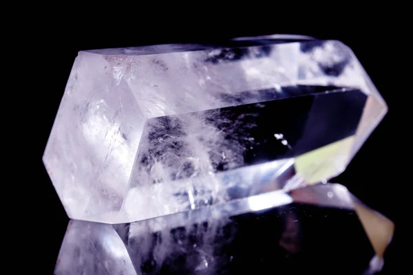 Macro mineral stone Crystal rock crystal on a black background — Stock Photo, Image