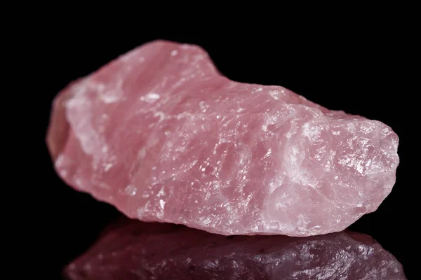 Macro mineral stone Pink quartz on black background — Stock Photo, Image