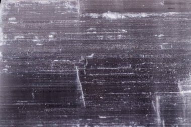 Macro mineral stone Selenite on black background clipart