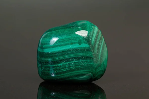 Macro mineral stone malachite on a black background — Stock Photo, Image