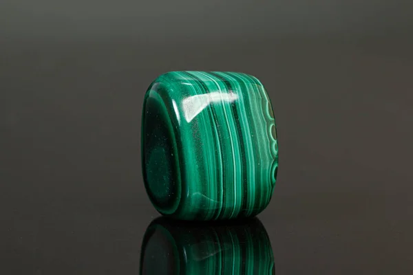 Macro mineral stone malachite on a black background — Stock Photo, Image