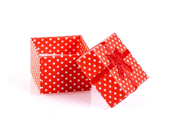 Beautiful new year red gift boxes on white background — Stock Photo, Image