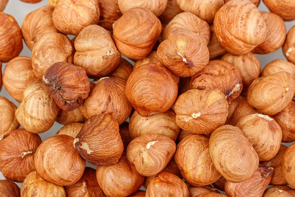 Macro hazelnuts nuts on a white background — Stock Photo, Image