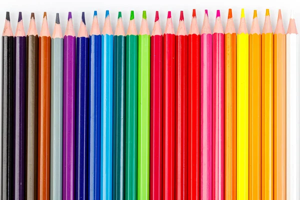 Макро різнокольорові олівці на білому тлі — стокове фото