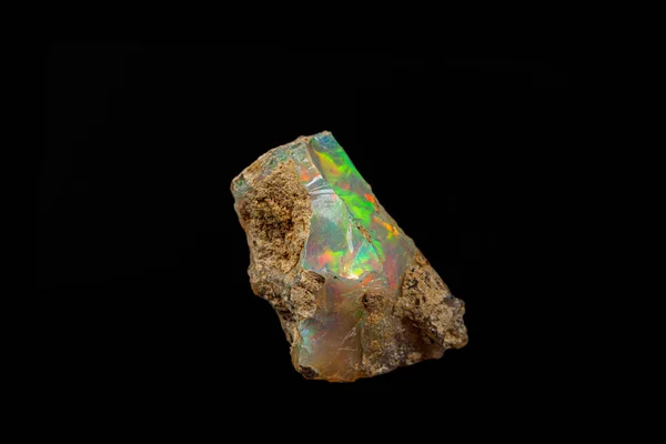 Macro mineral stone rare and beautiful opals on a black backgrou — 스톡 사진