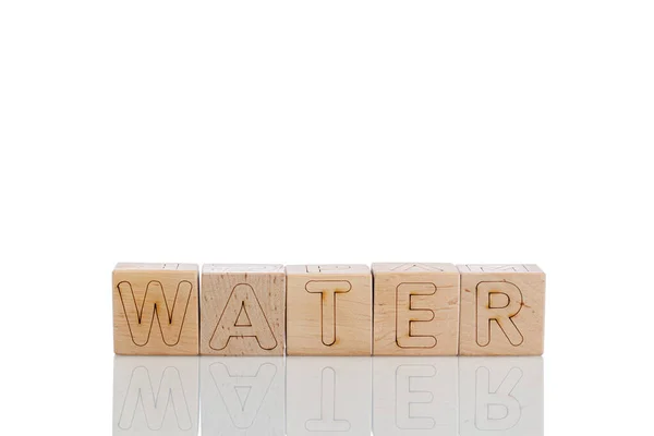 Houten Blokjes Met Letters Water Een Witte Achtergrond Close — Stockfoto