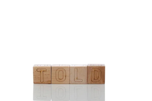Деревянные Кубики Буквами Рассказанными Белом Фоне Крупным Планом — стоковое фото