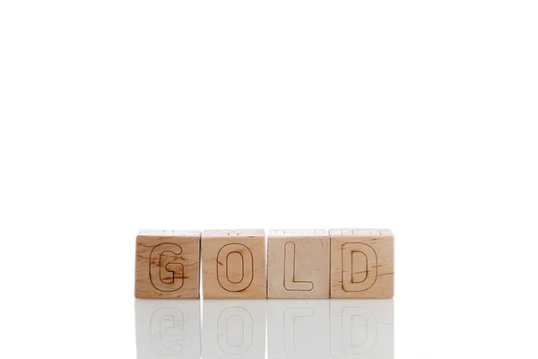 Wooden Cubes Letters Gold White Background Close — Stock Photo, Image