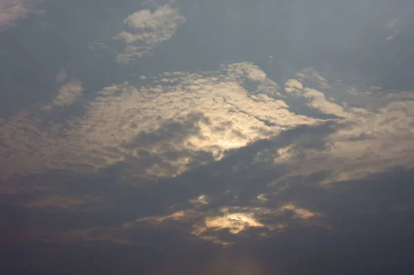 The rays of the sun coming in from the ocean of clouds