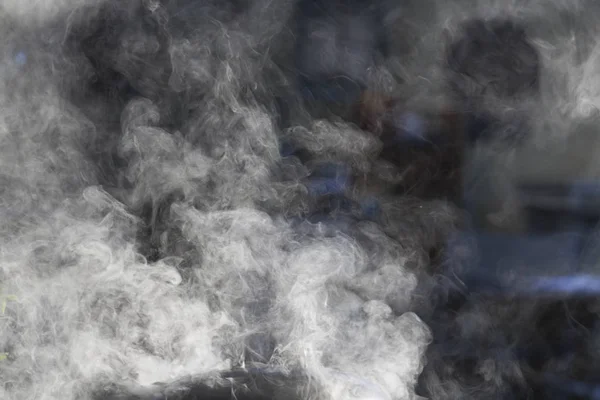 smoke clouds from a smokehouse