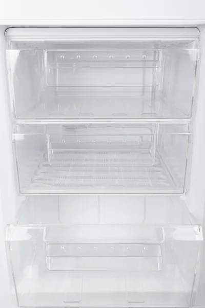 Білий холодильник ізольований на білому тлі — стокове фото