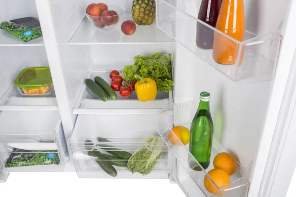 Offener Kühlschrank voller frischem Obst und Gemüse — Stockfoto
