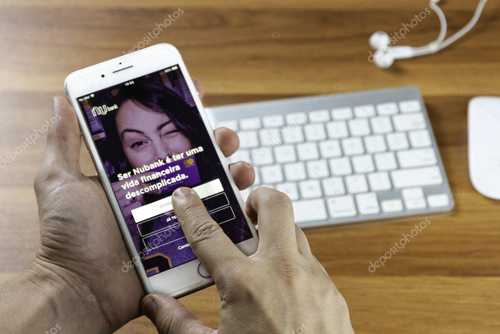 January 08, 2020, Brazil. Nubank logo on the screen of the mobile device.  Pioneer Brazilian startup company in the financial services segment. The Largest fintech in Latin America.
