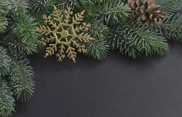 Gold snowflake and Christmas tree — Stock Photo, Image